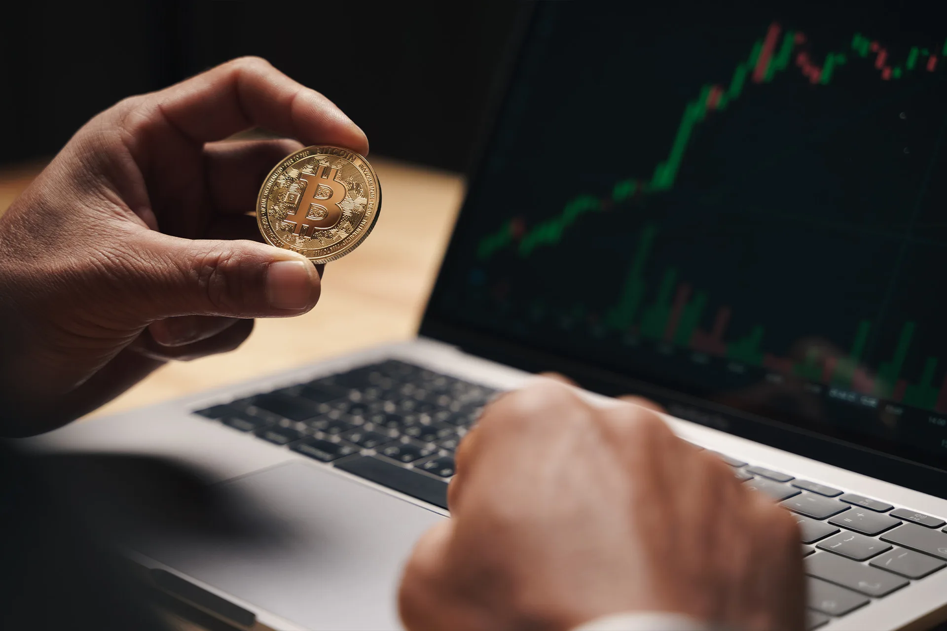 businessman holding bitcoin