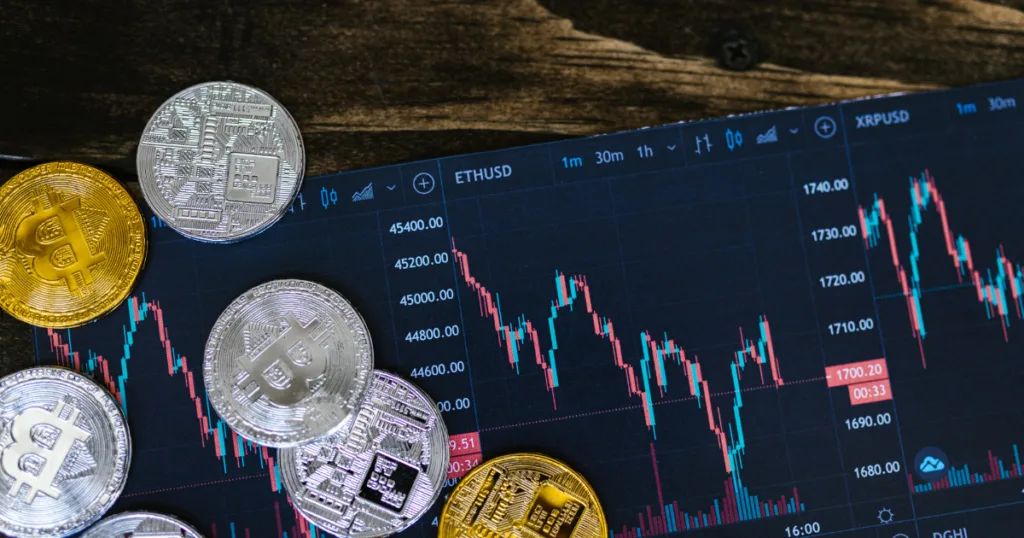 Crypto coins on live ETH and XRP chart representing CASP framework