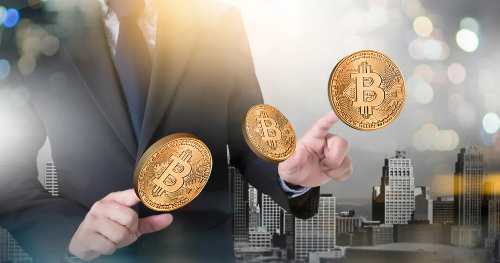 Businessman interacting with Bitcoin graphics representing Crypto Compliance and Virtual Asset Service Provider (VASP)
