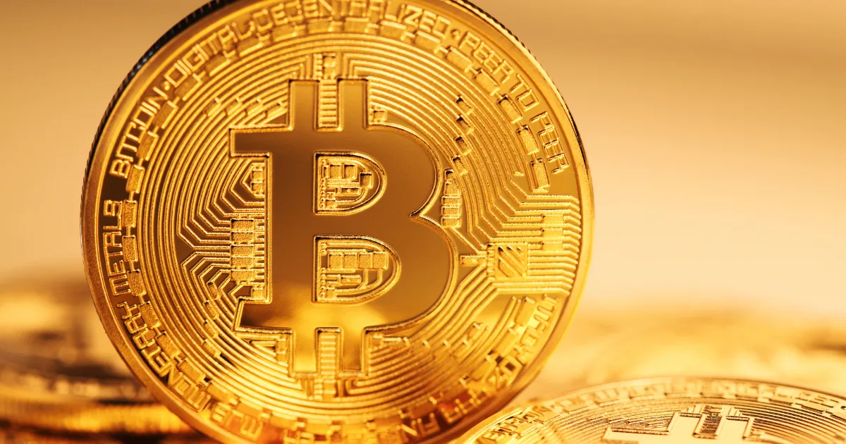Close-up of a shiny Bitcoin, symbolizing digital currency growth